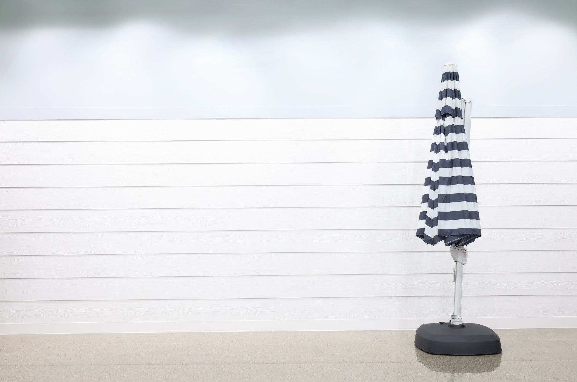 Savannah 380cm Octagonal Cantilever Umbrella - Navy Stripe w/ Wheeled Resin Base