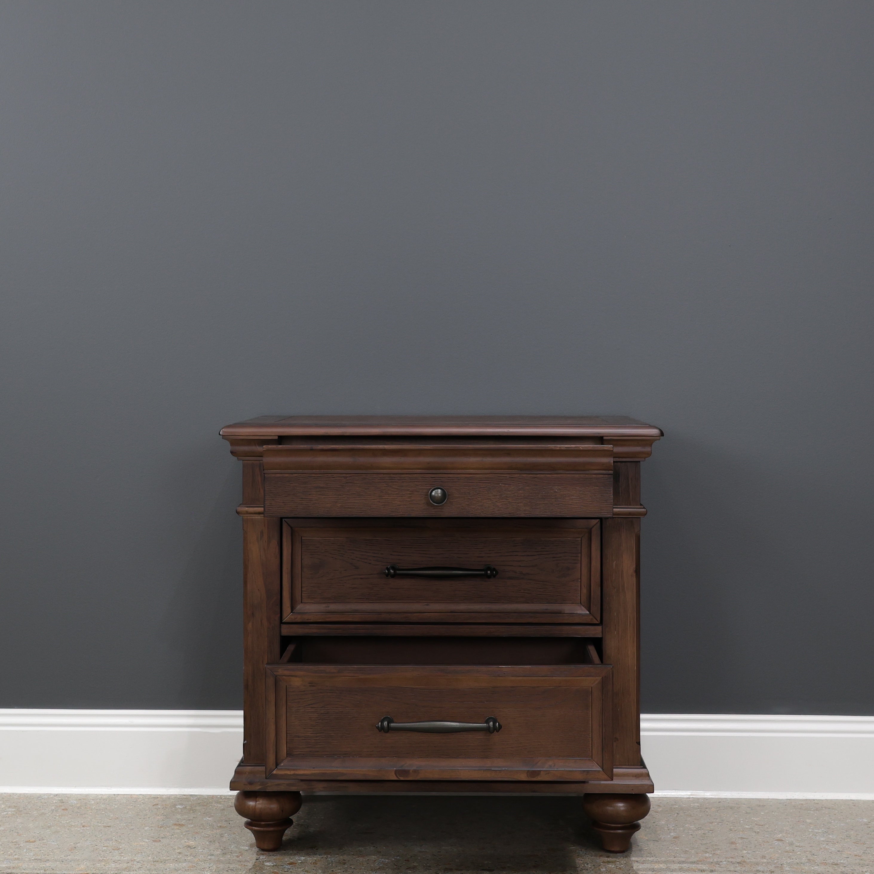 Melton Bedside Table w/ 3 Drawers - Dark Auburn